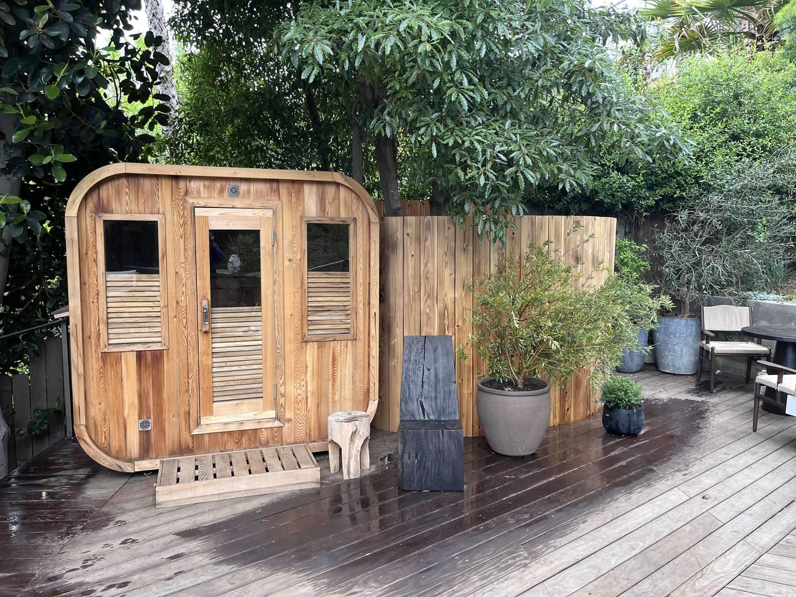 Outdoor cabin sauna assembled on a deck